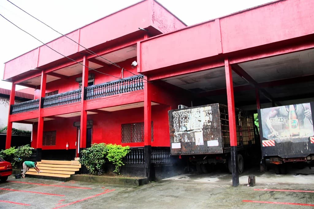 G3-Biz Ltd distribution facility with delivery trucks in Limbe
